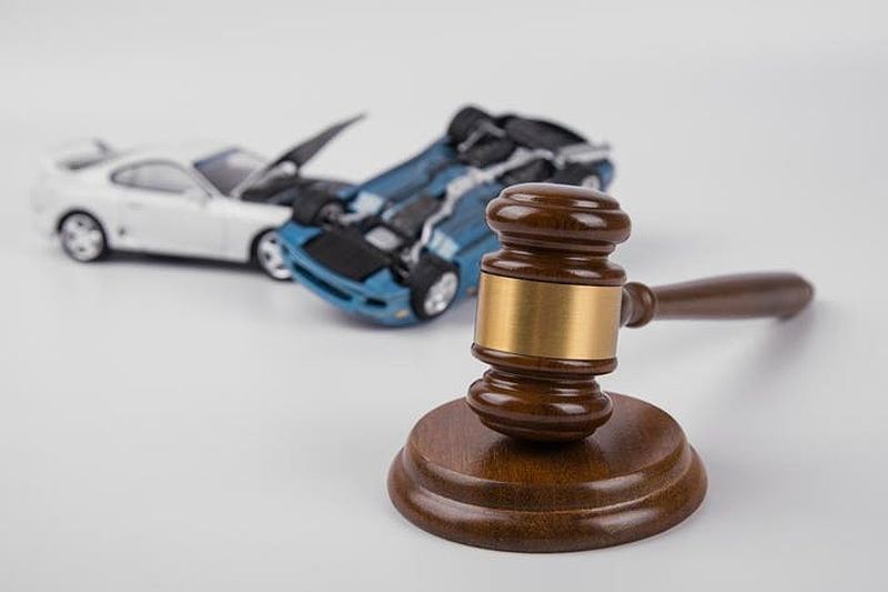 Judge's gavel and car collision illustration